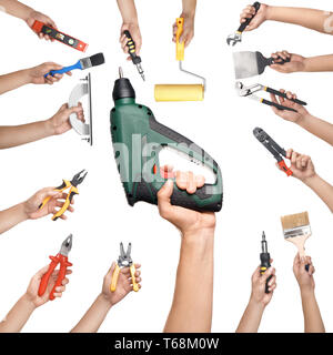 Male hands with different repair tools on white background Stock Photo