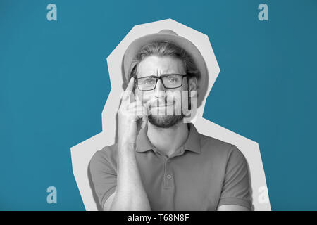 Handsome thoughtful man on color background Stock Photo