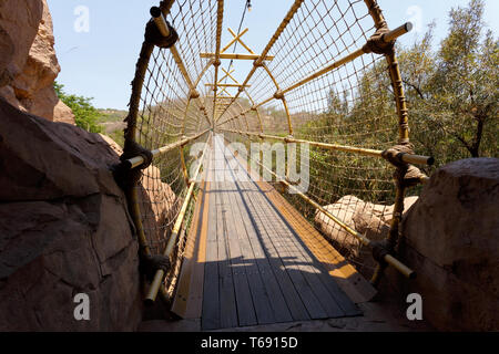 suspension rope bridge in Sun City South Africa Stock Photo