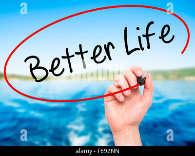 Man Hand writing Better Life with black marker on visual screen Stock ...