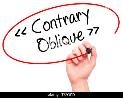 Man Hand writing Contrary - Oblique with black marker on visual screen Stock Photo