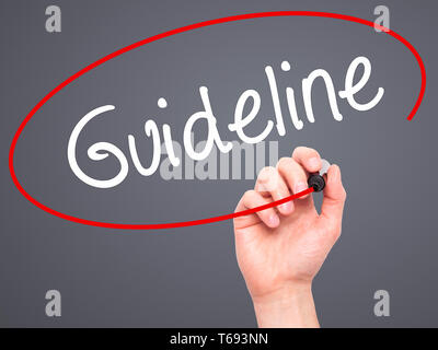 Man Hand writing Guideline with black marker on visual screen Stock ...