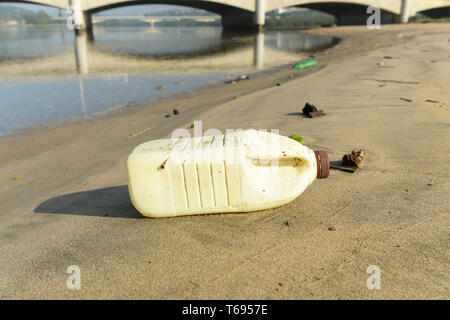 Durban, KwaZulu-Natal, South Africa, plastic pollution, food packaging, single bottle washed up on beach of Umgeni river estuary, objects, landscape Stock Photo