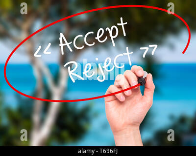 Man Hand writing Accept - Reject  with black marker on visual screen. Stock Photo