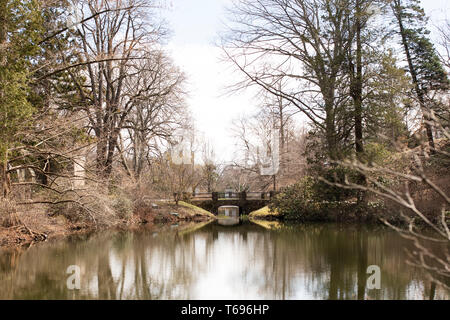 The bridge over Auburn Lake in Mount Auburn Cemetery in Cambridge, Massachusetts, USA. Stock Photo