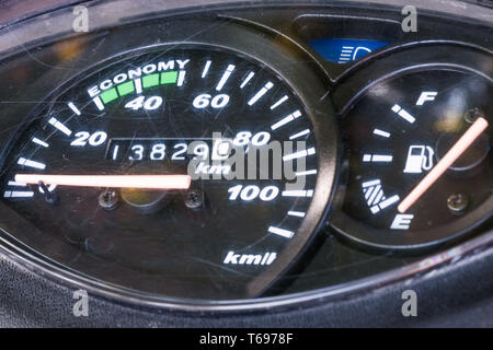 Scooter scratched speedometer Closeup view Stock Photo