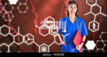 Composite image of asian nurse with stethoscope looking at the camera Stock Photo
