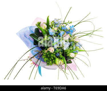 Flower bouquet from pink roses, iris and other flowers. Stock Photo