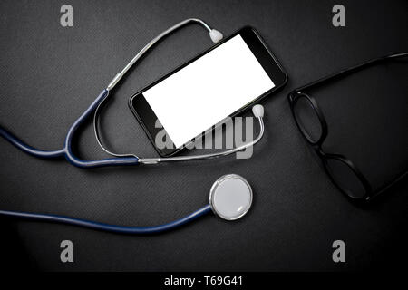 Metaphor of the dependence on health of a new generation of mobile phone that has penetrated into all spheres of life and through social networks affe Stock Photo