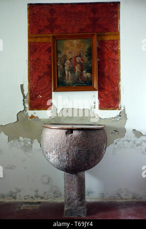 baptismal font in parish church Porto Moniz Stock Photo