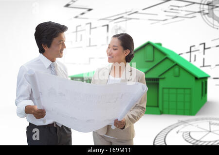 Composite image of estate agent looking at blueprint with potential buyer Stock Photo