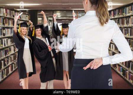 Composite image of businesswoman offering handshake with fingers crossed behind her back Stock Photo