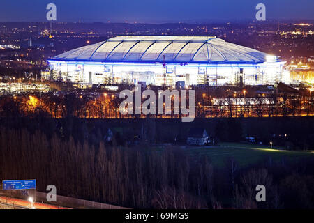 illuminated football stadium Veltins-Arena from Schalke 04 in twilight, Gelsenkirchen, Germany Stock Photo