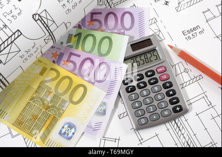 house construction with plan, euro and calculator Stock Photo