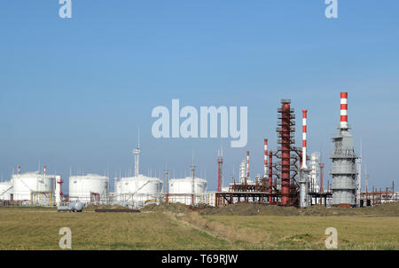 Distillation columns, pipes and other equipment furnaces refinery. Stock Photo