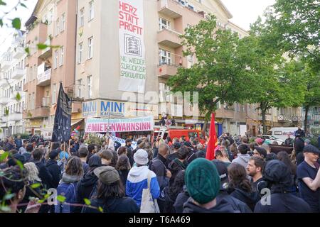 Berlin, Germany. 30th Apr, 2019. Participants of a demonstration walk through the district of Wedding. The demonstration of left-wing groups on the eve of 1 May will be held under the motto 'Hands off Wedding'. The participants want to protest against high rents. Credit: Jörg Carstensen/dpa/Alamy Live News Stock Photo
