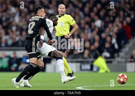 London, UK. 30th Apr 2019.Tottenham midfielder Moussa Sissoko holds off a challenge from Ajax defender Noussair Mazraoui during the UEFA Champions League match between Tottenham Hotspur and Ajax Amsterdam at White Hart Lane, London on Tuesday 30th April 2019. (Credit: Jon Bromley | MI News) Credit: MI News & Sport /Alamy Live News Stock Photo