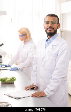 Confident young laboratory scientist Stock Photo