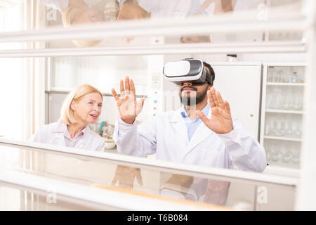 Using virtual reality for scientific experiment Stock Photo