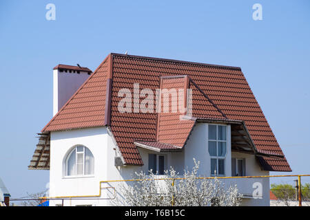 The roof of corrugated sheet on the houses Stock Photo