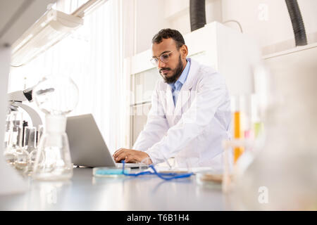 Working on research in laboratory Stock Photo