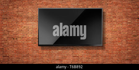 Black LED tv television screen blank on red wall background Stock Photo