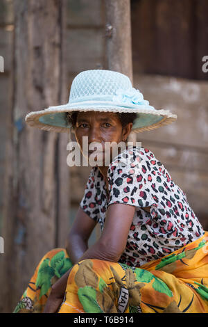 Portrait of old Malagasy woman with straw hat Stock Photo