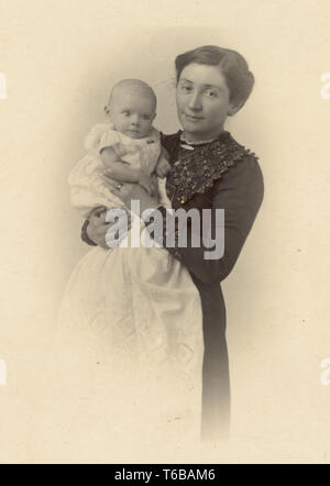 WW1 era postcard of mother holding her 9 weeks old baby girl - Emily ...