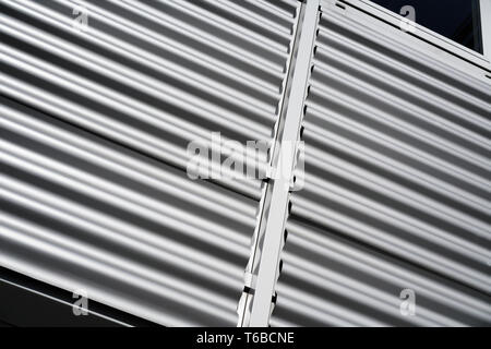 corrugated sheet metal made of aluminium on a facade Stock Photo