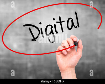 Man Hand writing Digital with black marker on visual screen Stock Photo