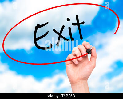 Man Hand writing Exit with black marker on visual screen. Isolated on ...