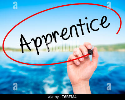 Man Hand writing Apprentice with black marker on visual screen ...