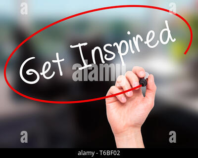 Man Hand writing Get Inspired with black marker on visual screen ...