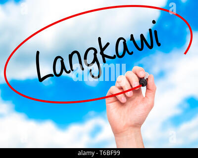 Man Hand writing Langkawi  with black marker on visual screen. Stock Photo