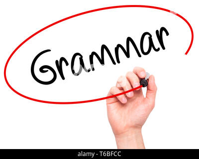 Man Hand writing Grammar with black marker on visual screen Stock Photo