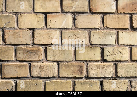 Wall made of yellow bricks Stock Photo