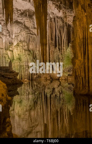 Neptune's Grotto (Grotta di Nettuno) a natural stalactite cave near Alghero , Sardinia, Italy. Accessible when the waters are calm by a steep stairway Stock Photo