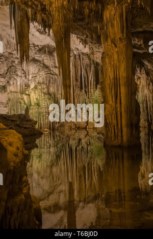 Neptune's Grotto (Grotta di Nettuno) a natural stalactite cave near Alghero , Sardinia, Italy. Accessible when the waters are calm by a steep stairway Stock Photo