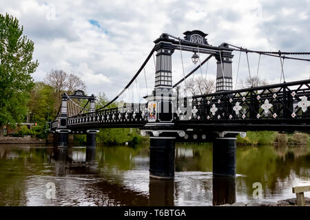 The Ferry Bridge Pedestrian Bridge over the River Trent at Stapenhill Gardens ,Burton upon Trent.Staffordshire.England Stock Photo