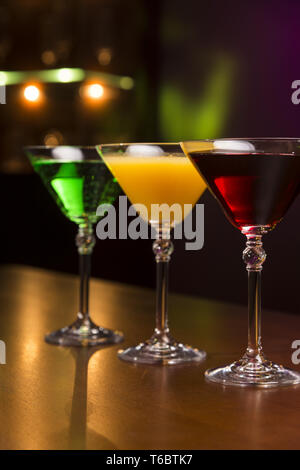 Three exotic cocktails in bar Stock Photo