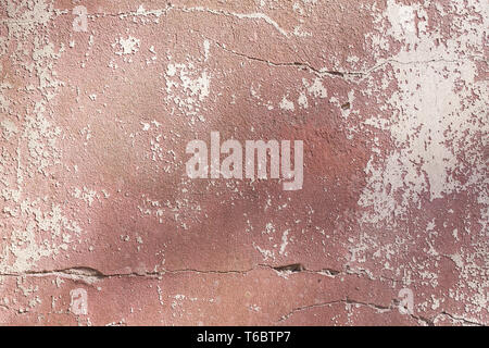 old grungy plastered wall with peeling color Stock Photo