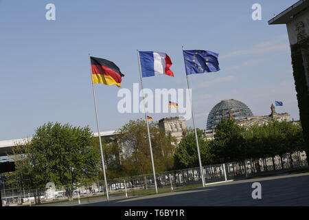 Berlin, Germany. 29th Apr, 2019. 29.04.2019, Berlin, Germany, Chancellor Angela Merkel, together with French President Emmanuel Macron, receives the six heads of state and government from the Western Balkans Bosnia-Herzegovina, Croatia, Kosovo, Montenegro, Serbia and Slovenia. Among other things, the meeting will focus on the EU perspective of Albania, North Macedonia, Montenegro, Serbia, Kosovo and Bosnia-Herzegovina. The photo shows flags in the courtyard of the Federal Chancellery in Berlin. Credit: Simone Kuhlmey/Pacific Press/Alamy Live News Stock Photo