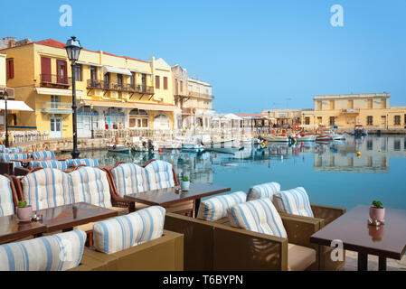 Terrace with view on the harbor of Rethymno in Crete, Greece Stock Photo