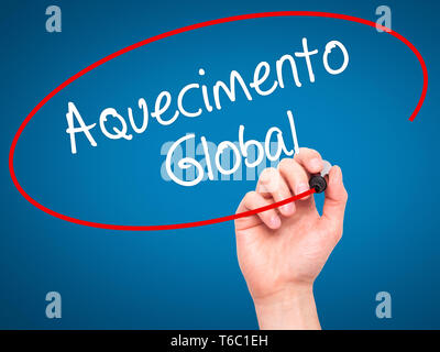 Man Hand writing Aquecimento Global (Global Warming in Portuguese) with black marker on visual screen. Stock Photo