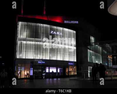 Birmingham, United Kingdom - March 17 2019:   A nighttime photograph of teh frontage of Zara fashion store in Worcester Street Stock Photo