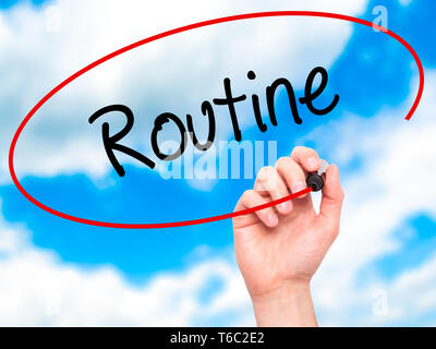 Man Hand writing Routine with black marker on visual screen. Isolated ...