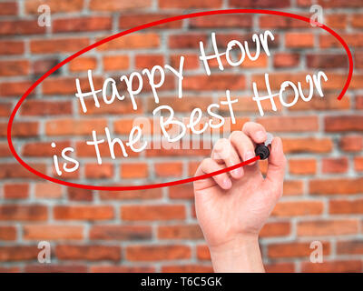 Man Hand writing Happy Hour is the Best Hour  with black marker on visual screen Stock Photo