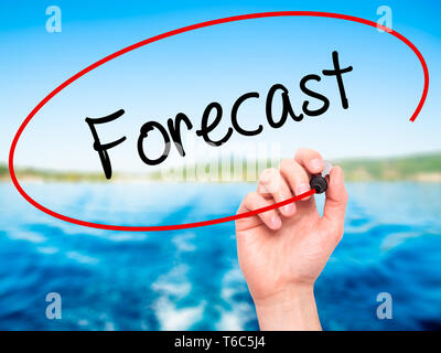 Man Hand writing Forecast with black marker on visual screen Stock Photo