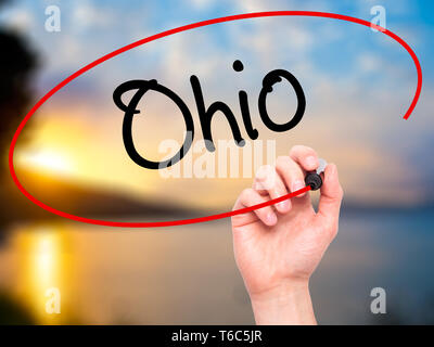 Man Hand writing Ohio  with black marker on visual screen Stock Photo