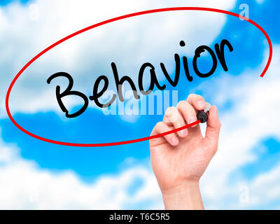 Man Hand writing Behavior with black marker on visual screen. Isolated ...